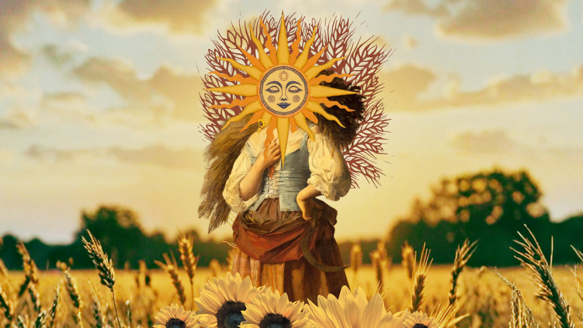 Lammas blog banner featuring wheat and harvest symbolism with the sun and a baby