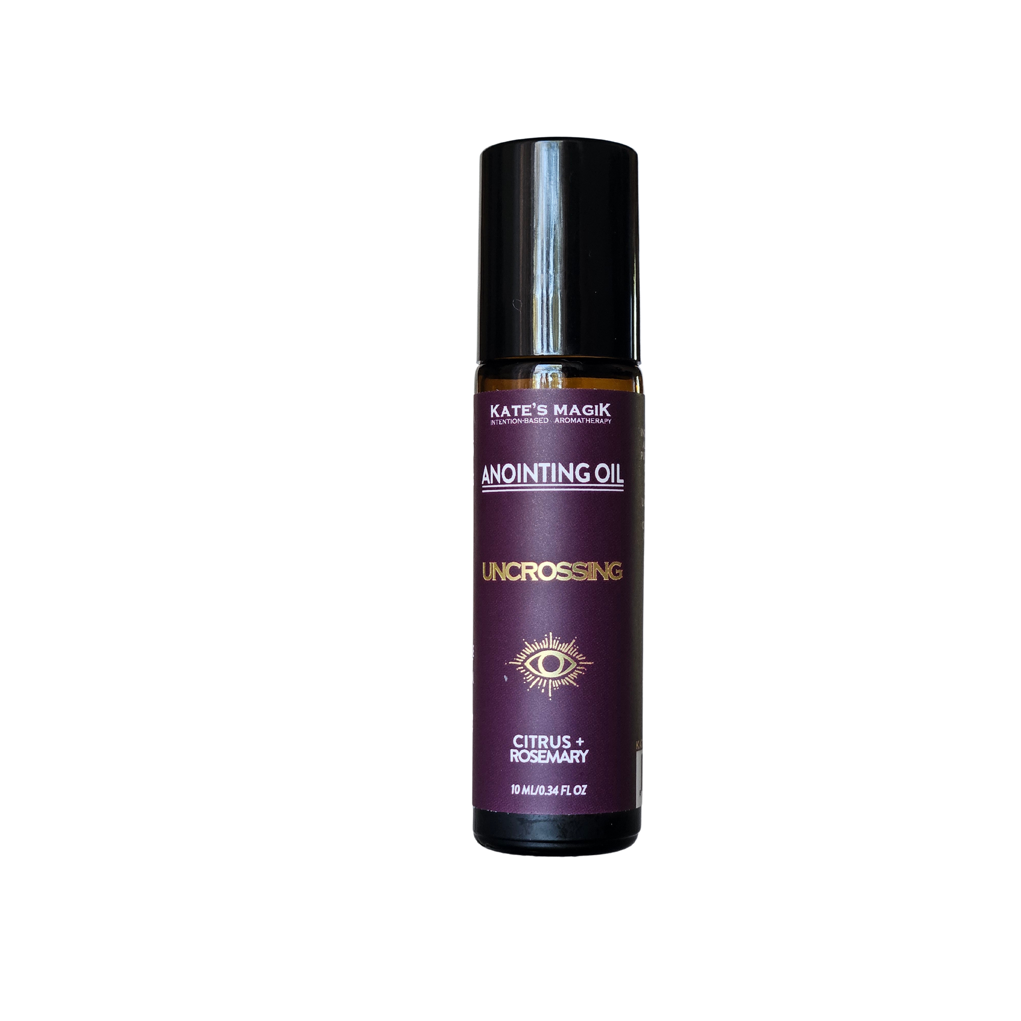 Kate's Magik Anointing Oil Uncrossing in a dark purple bottle with a black cap, featuring gold and white text on a white background.