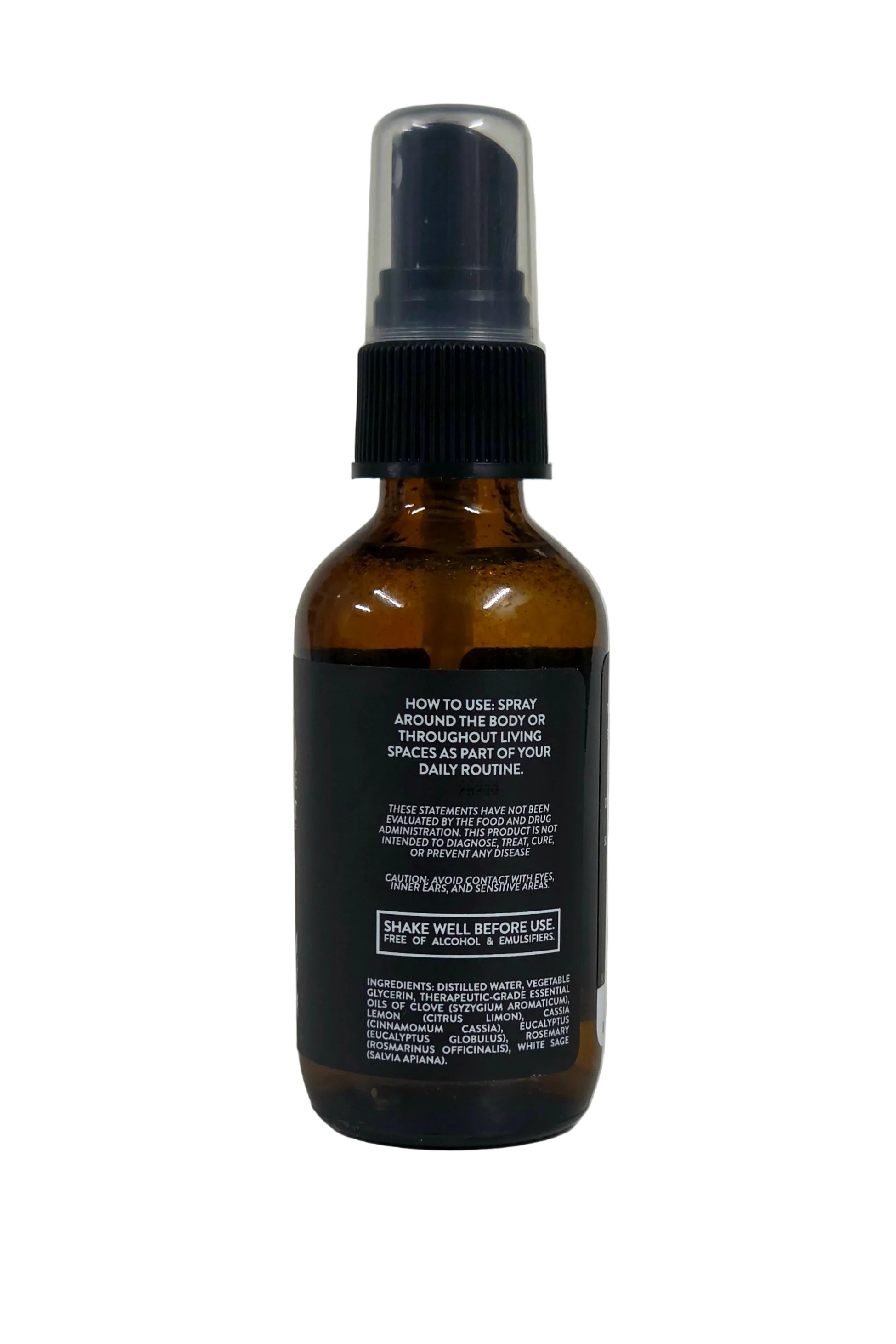 An amber glass spray bottle with a black spray top and a black label containing white text, photographed against a neutral light gray background.